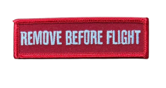 Iron-on badges - Remove Before Flight